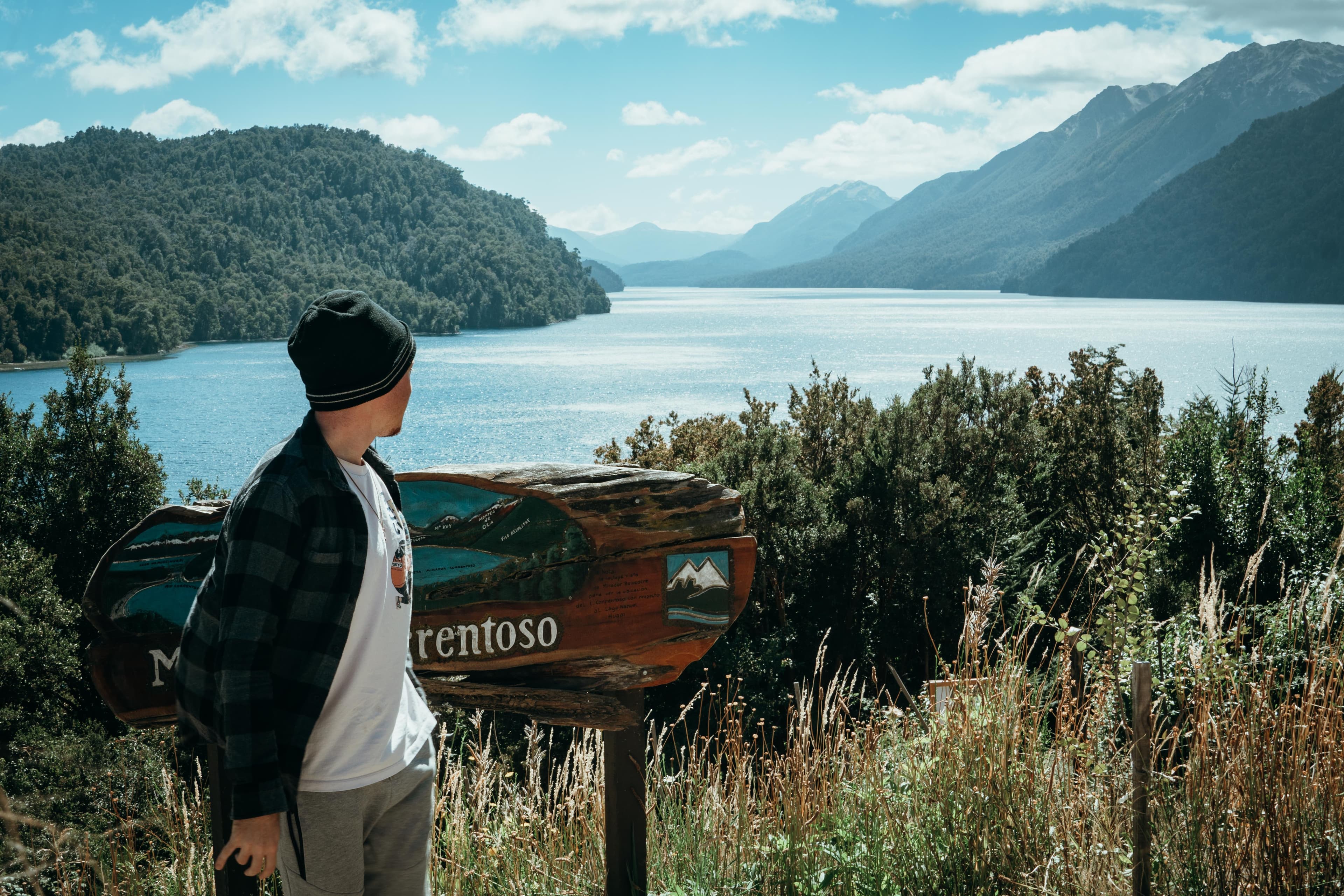 Finch Bergling looking out over a lake in Patagonia